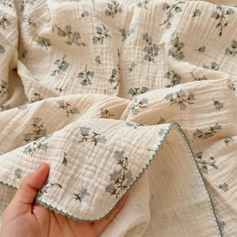 The Wanderlight Muslin Swaddle